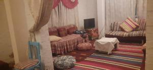 Posezení v ubytování Rural Guest House فندق البيت الريفي + 37 fotografií