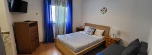 Cama ou camas em um quarto em Guesthouse of Alcobaça