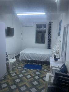 A bed or beds in a room at Vue de Vallee