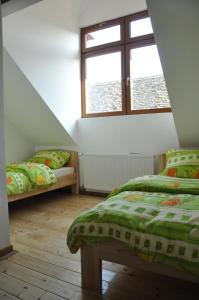 Postelja oz. postelje v sobi nastanitve Guest House Anna Caffe