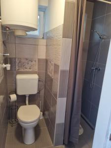 Kúpeľňa v ubytovaní Napfény Apartman + 12 fotografií