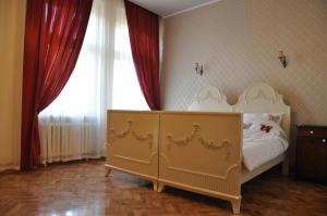 Postelja oz. postelje v sobi nastanitve Guest House Anna Caffe