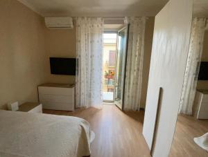 Postel nebo postele na pokoji v ubytování Camera privata vicino spiaggia