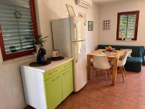 Kuchyň nebo kuchyňský kout v ubytování Vacation Home Palma
