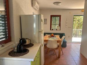 Kuchyň nebo kuchyňský kout v ubytování Vacation Home Palma