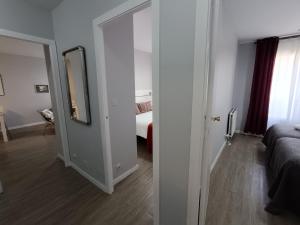 Postel nebo postele na pokoji v ubytování SUITEDREAMS - Av. Fener