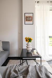 Predel za sedenje v nastanitvi Glyfada First Class Suite