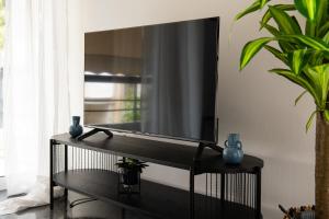 Predel za sedenje v nastanitvi Glyfada First Class Suite