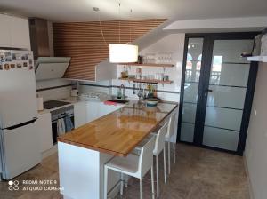 Dapur atau dapur kecil di Apartamento de Calidad en Almerimar con Excelente Vista al Mar y buena Ubicacion