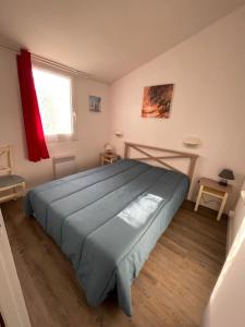 Postel nebo postele na pokoji v ubytování Maison DOLUS 4pers dans Résidence Privée avec Piscine et SPA