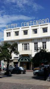 a building with a hotel centriculum on top of it at Hotel Centenario in Guatemala