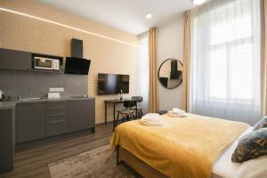 Posteľ alebo postele v izbe v ubytovaní CORU House
