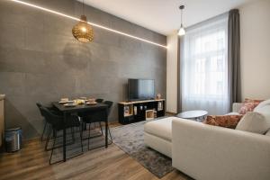 Televízia a/alebo spoločenská miestnosť v ubytovaní CORU House