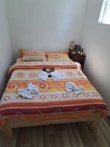 Postel nebo postele na pokoji v ubytování Eco Village Podgora Household Kaljevic
