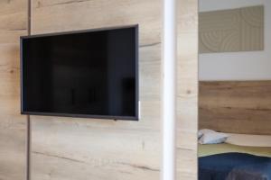 TV a/nebo společenská místnost v ubytování Ferienwohnung Oba'doba 2