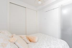 Postel nebo postele na pokoji v ubytování Puerta del Centro