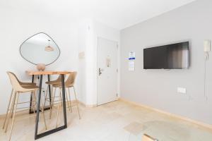 TV a/nebo společenská místnost v ubytování Puerta del Centro