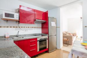 Kuchyň nebo kuchyňský kout v ubytování Puerta del Centro
