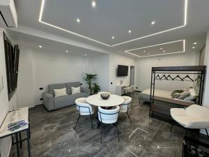 Posezení v ubytování GRA' Suite Deluxe