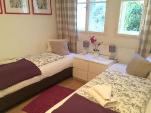 Rúm í herbergi á Cityhotel Junger Fuchs