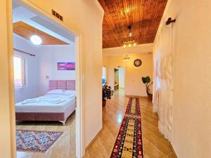 Postel nebo postele na pokoji v ubytování Enma Rooms