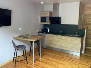 Billede fra billedgalleriet på Logement avec jacuzzi Murat i Murat