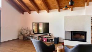 Posezení v ubytování Chalet Súľov - Pool & Sauna