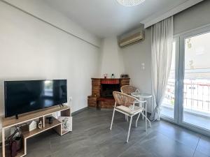 TV a/nebo společenská místnost v ubytování G&G Seaside Apartment