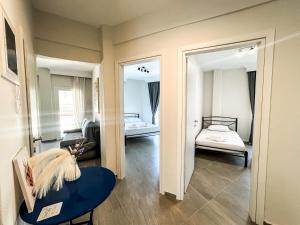 Postel nebo postele na pokoji v ubytování G&G Seaside Apartment