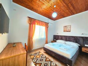 Postel nebo postele na pokoji v ubytování Enma Rooms