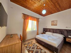 Postel nebo postele na pokoji v ubytování Enma Rooms