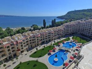 an aerial view of a resort with two pools at Sunrise Luxury Sauth Bay in Varna City