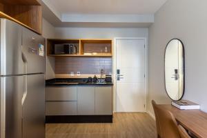 A cozinha ou cozinha compacta de 360 Ambience Vila Mariana