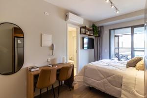 Cama ou camas em um quarto em 360 Ambience Vila Mariana