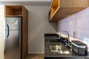 A cozinha ou cozinha compacta de 360 Ambience Vila Mariana