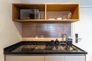 A cozinha ou cozinha compacta de 360 Ambience Vila Mariana