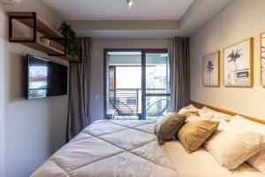 Cama ou camas em um quarto em 360 Ambience Vila Mariana