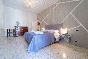 A bed or beds in a room at Casa Francesca