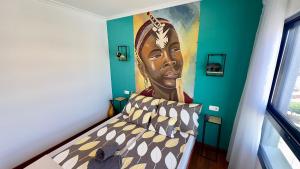 Giường trong phòng chung tại Blaumar Atico +23 ảnh