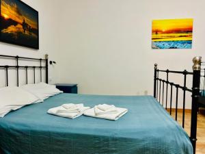Postel nebo postele na pokoji v ubytování B&B Tramonti d'aMare + 37 fotografií
