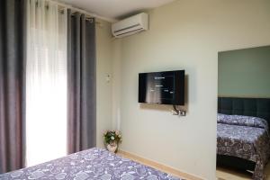 Кровать или кровати в номере Cozy Appartment