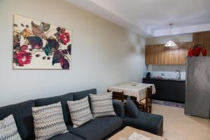 Кухня или мини-кухня в Cozy Appartment
