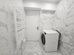 Billede fra billedgalleriet på Au Mboa Appartement 2 Chambres au Coeur de Conflans i Conflans-Sainte-Honorine + 19 billeder