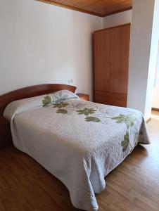 Ένα ή περισσότερα κρεβάτια σε δωμάτιο στο Ibu Beer&Grill