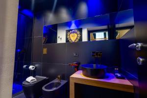 Maximum hub suite&spa tesisinde bir banyo