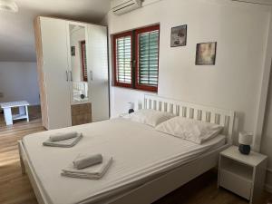 Postel nebo postele na pokoji v ubytování Vacation Home Palma