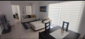 Ένα ή περισσότερα κρεβάτια σε δωμάτιο στο bonito departamento en yecapixtla con alberca