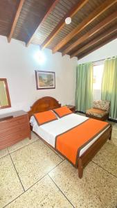 Letto o letti in una camera di Hotel Tequendama