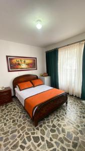 Letto o letti in una camera di Hotel Tequendama