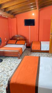 Letto o letti in una camera di Hotel Tequendama